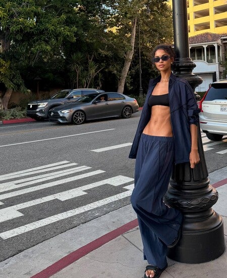 image by daianesodre containing woman, stand, road, blue, black